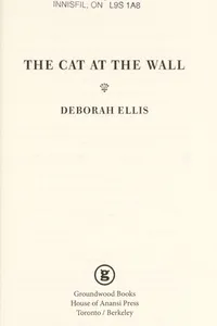 The cat at the wall