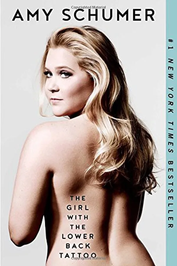 Capa de The girl with the lower back tattoo