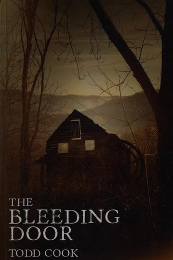 Capa de The bleeding door