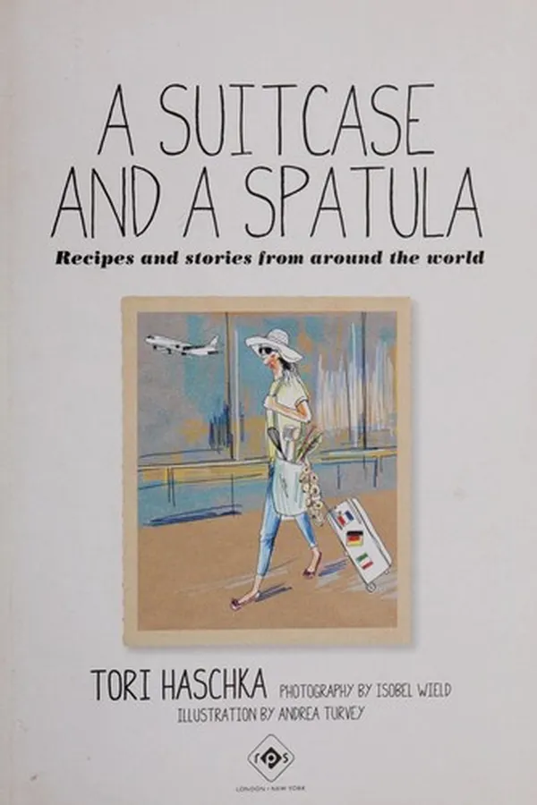 Capa de A suitcase and a spatula