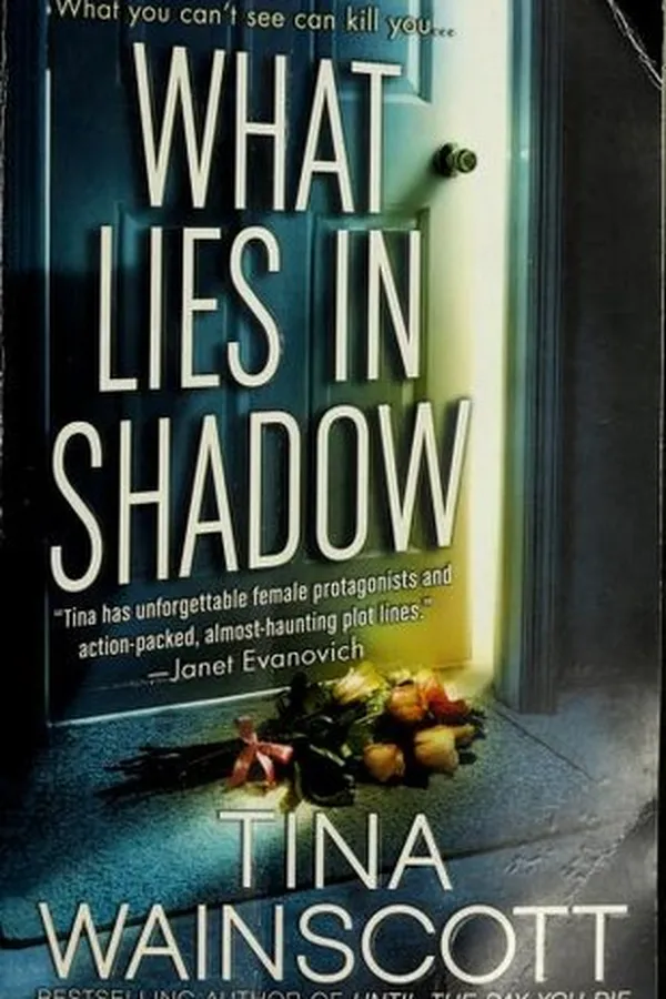 Capa de What Lies in Shadow